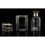 Two Silver Topped Glass Vanity Jars To include pin jar and powder jar - all hallmarks rubbed.
