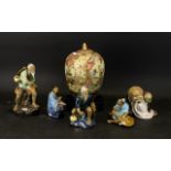 A Collection Of Oriental Ceramics And Figures To include 20th century Satsuma style lidded ginger