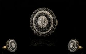 9ct Gold Black and White Diamond Set Cluster Ring - of oval shape in a very attractive flower head