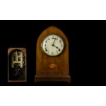 Early 20th Century Mantle Clock Lancet form oak cased clock with inlaid detail to front,