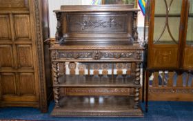 A Carved Oak Continental Buffet Of large proportion with barley twist supports,