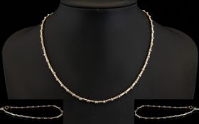 Contemporary Silver Bead Necklace And Bracelet Suite Silver collar style necklace comprising fine