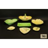 A Collection Of Carlton Ware Floral Design Ceramics Seven pieces in total to include green and