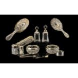 A Small Mixed Lot Of Silver Items All in as found condition to include vanity set, scent bottles,