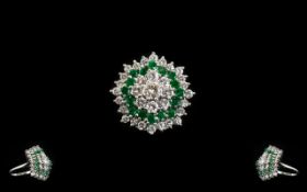 18ct White Gold Large and Impressive Emerald and Diamond Cocktail Ring - of flower head design. Both