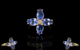 9ct Gold Tanzanite And Diamond Ring Central diamonds surrounded by four pear cut tanzanites. Fully