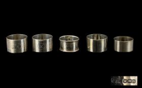 A Collection Of Six Silver Napkin Rings Various designs and dates, all in good condition.