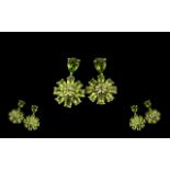 Peridot Flower Drop Earrings, each comprising a ring of pear cut peridots surrounding a round cut,