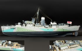 Two British Model War Ships including a Large aircraft carrier .