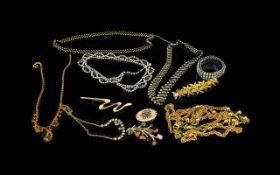 A Collection of Quality Costume Jewellery to include a vintage oval scarf clip with sunflower