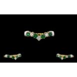 18ct Gold - Attractive Emerald and Diamond Set Wishbone Ring, Set with 4 Emeralds and 3 Diamonds,