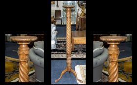 An Early 20th Century Barley Twist Torchere Of large proportion raised on trefoil base with