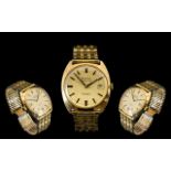 Bulova Ambassador Automatic Gents 9ct Gold Wrist Watch, On a yellow metal bracelet,