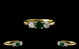 18ct Gold - Superb Quality 3 Stone Diamond and Emerald Dress Ring.