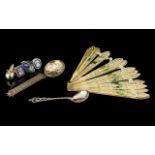 A Small Mixed Lot comprising three white metal paste set rings, Continental silver mustard spoon,