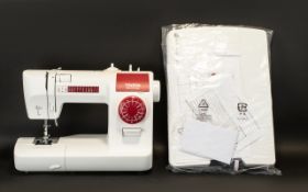 Toyota SP10 Series Sewing Machine ERG15R Ergonomic Design in white and red,