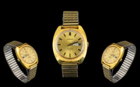 Garrards - Gold Plated Gents 25 Jewel Day-Date Incabloc Automatic Wrist Watch. c.1970's.