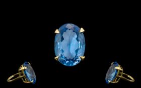 A Superb 9ct Gold Single Stone Blue Topaz Set Dress Ring From The 1960's.