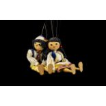 A Pair Of Vintage Wooden Puppets two hand operated string puppets, boy and girl,