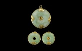 A Matched Set of 3 9ct Gold Mounted Jade Pendants of Circular Form,
