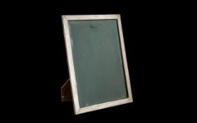 Early 20thC Continental Silver Photo Frame. Stamped 800, glazed front, wooden back with strut.