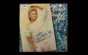 Olivia Newton John Autograph on L.P record sleeve, with record.