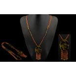 Art Deco Long Cut Metal Bead And Faux Tortoiseshell Necklace African influence long beaded necklace