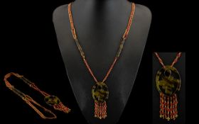 Art Deco Long Cut Metal Bead And Faux Tortoiseshell Necklace African influence long beaded necklace