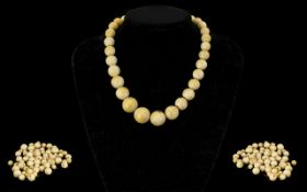 A Quantity Of Antique Ivory Spherical Beads Varying sizes,