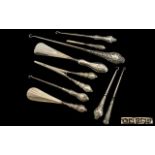 A good Collection of Edwardian Period Ornate Embossed Silver Handle Boot Hooks - Shoe Horns and