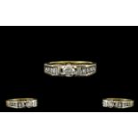 Contemporary Designed 18ct Gold Brilliant and Baguette Cut Diamond Set Ring marked 750-18ct,