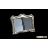 Sterling Silver Ornate Photo Frame, Marked "RBB Silversmith The Frame measures 7.5" Tall by 8.