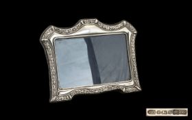 Sterling Silver Ornate Photo Frame, Marked "RBB Silversmith The Frame measures 7.5" Tall by 8.