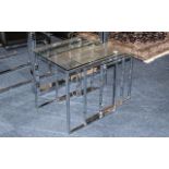 Contemporary Nest of Three Tables tinted glass top on square chrome supports, the smallest being 21.