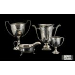 Four Pieces Of Silver To Include Three Various Sized Twin Handled Trophies,
