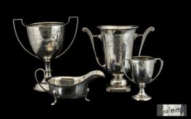 Four Pieces Of Silver To Include Three Various Sized Twin Handled Trophies,