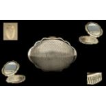 Kigu 1960's Superb Sterling Silver Oval Shaped Bright Cut Ladies Compact of Wonderful Form.