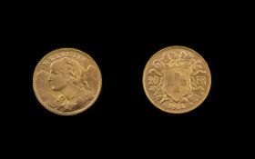 Swiss 20 Franc Gold Coin - Date 1935. Mint Mark Bern. Weight 6.45 grams. Gold Purity 900.