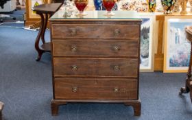 Late 19th/Early 20thC Chest of Drawers comprising four drawers with ornate circular brass pull