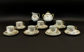 A Japanese Lustre Part Tea Service Comprising twin handle sugar bowl, milk jug,