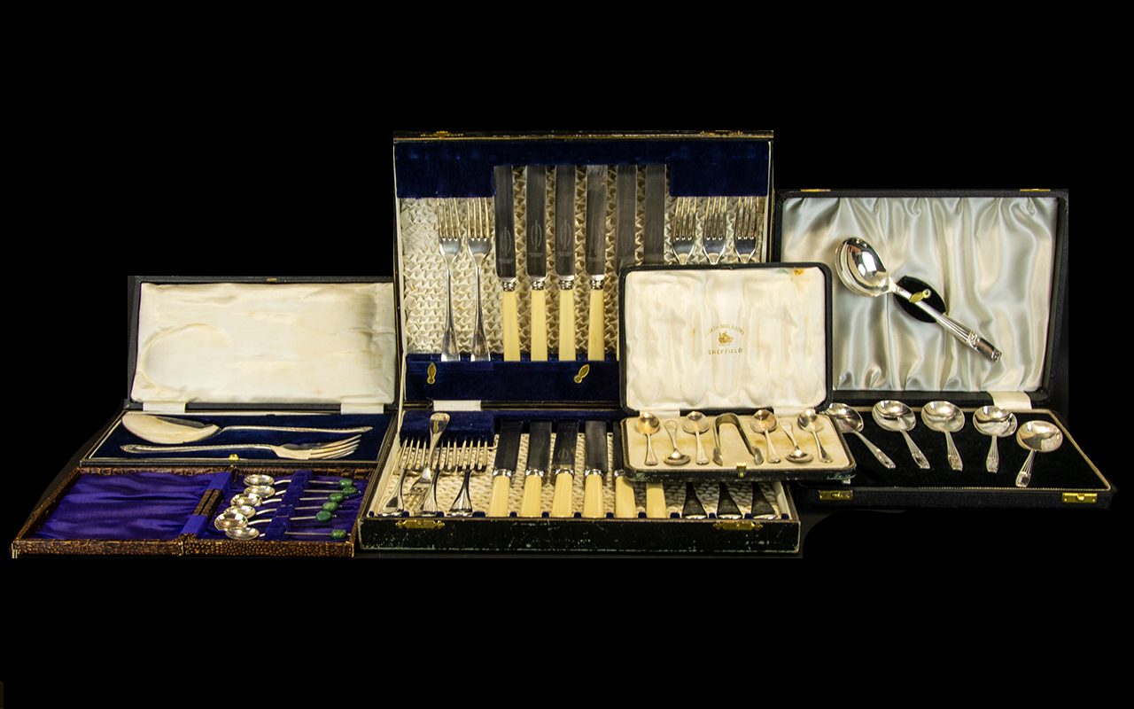 A Collection of Five Boxed Metalware Sets to include a set of six teaspoons with sugar nips by