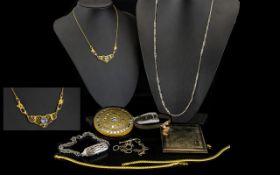 A Small Mixed Collection Of Costume Jewellery To include gold tone chains, silver tone compacts,
