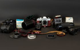 Praktika PLC2 35mm Camera And Lenses In red leather case, together with lenses, instructions,