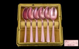 A Boxed Set Of 1950's Teaspoons By Elkalife Metallic candy pink tea spoons with stylised,