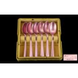 A Boxed Set Of 1950's Teaspoons By Elkalife Metallic candy pink tea spoons with stylised,