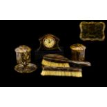 A Collection of Faux Tortoiseshell Dressing Table Items comprising brush, bedside table clock,