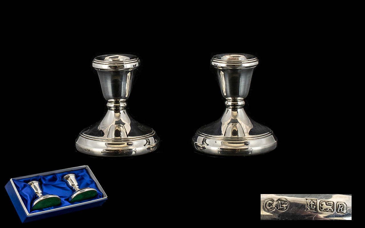 Pair of Sterling Silver Squat Candlesticks Marked for Birmingham 1991. 8 cms in height.