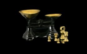 A Set Of Cast Metal Kitchen Scales By Libresco Of traditional form with seven imperial brass bell