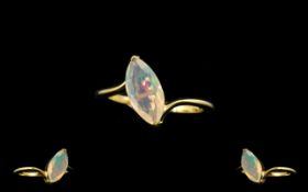 Opal Solitaire Ring, a marquise cut Ethiopian opal of 1ct, of perfect proportion,