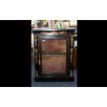 Victorian Black Lacquered French Style Book Case glazed front and Ormolu mounts, floral inlay.